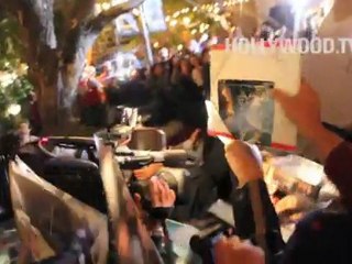 Daniel Radcliffe hangs with Mario Lopez at The Grove