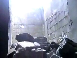 فري برس   حمص الخالدية دمار احد المباني بالقصف على الحي  6 2 2012