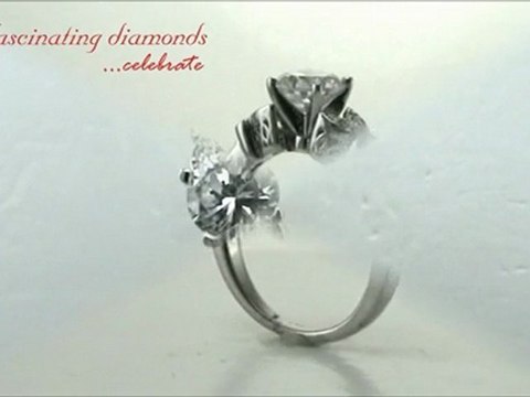 Round Cut Diamond Engagement Ring With Round Side Stones In Pave Setting