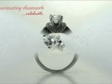 Round Cut Diamond Engagement Ring With Round Cut Side Stones In Micropave Setting