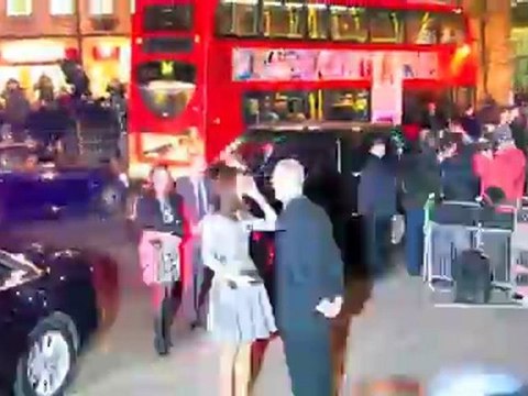 Kate Middleton Dazzles at First Solo Royal Appearance