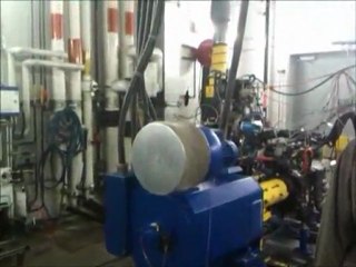 Dave Gunnels in the Pontiac Powertrain Engineering Center's Engine Room