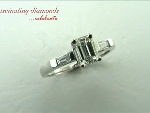 Emerald and Tapered Baguette Three Stone Diamond Engagement Ring