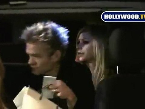 Avril Lavigne and Husband Leave Madeo.