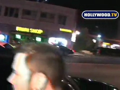 John Mayer Has Lip Stick Kisses All Over His Face.