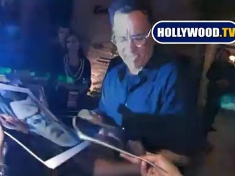Tom Hanks Signs A Lot of Autographs