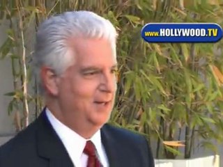 Brian Oxman All Smiles While Leaving CNN Building.