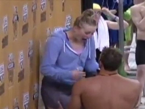 Olympic Swimmer Propses on Medal Stand