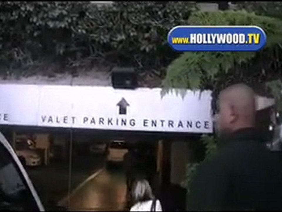 Lindsay Lohan Exits W Hotel After Photo Shoot