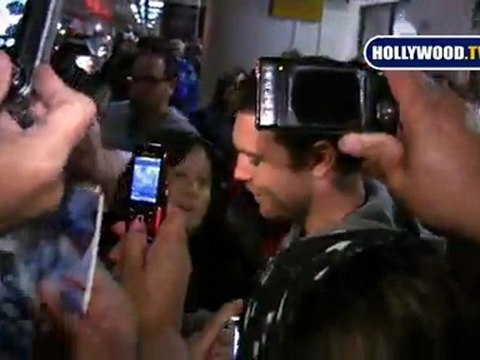 Sam Worthington Signs Autographs At LAX