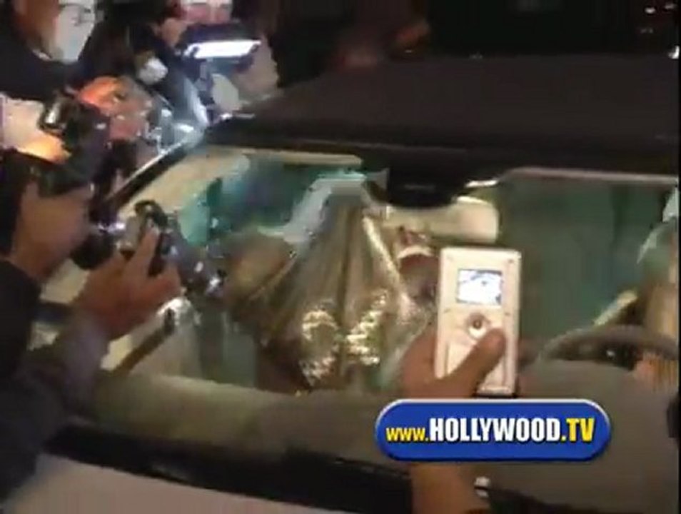 Britney Spears and Posse Run Over Paparazzi