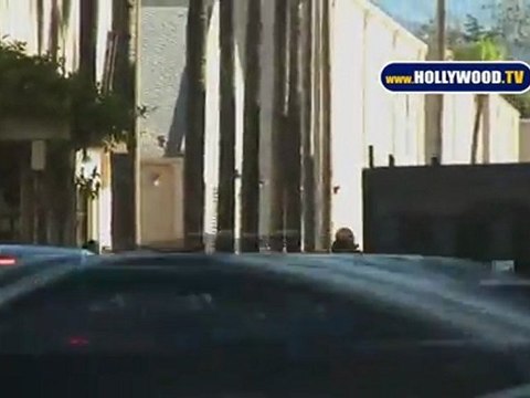 Charlie Sheen Flashes Two & Half Men Script on Way to Warner Bros!