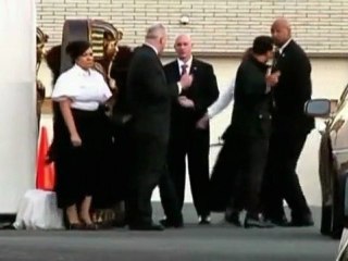 Guests arrive at Houston's funeral home
