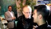 Larry King Greets Joe Jonas at Mastros Steakhouse