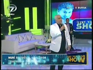 Nuri SESİGÜZEL " BAYGINIM  GÜLÜŞÜNE"