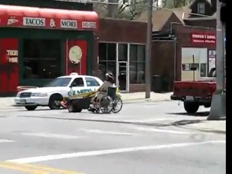 Woman Uses Motorized Wheelchair