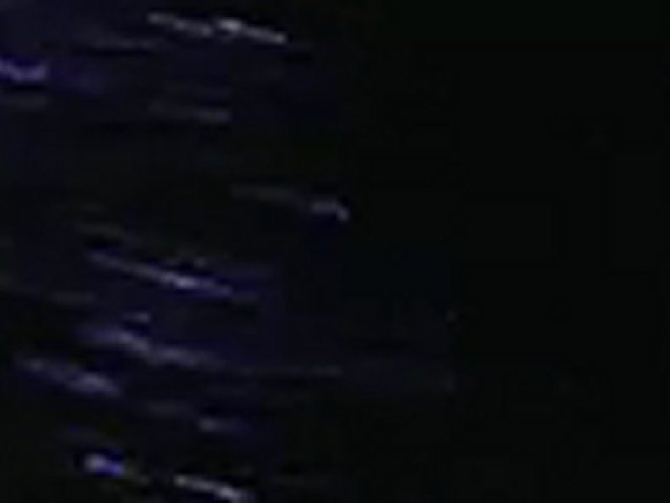 Tobey Maguire Leaves The Staples Center in the Rain.