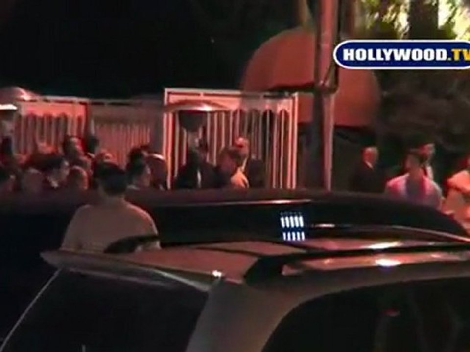 Robert Pattinson Smiles At Fans Outside Oscar After Party.