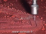 Découpe par jet d'eau pure haute pression d'une bavette en caoutchouc 70 shores - Sermab Dijon Bourgogne