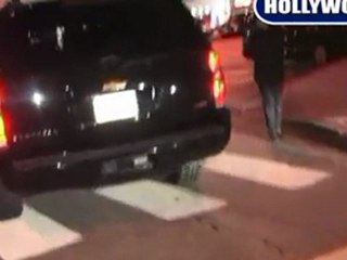 Paris Hilton Leaves Villa via Backdoor.
