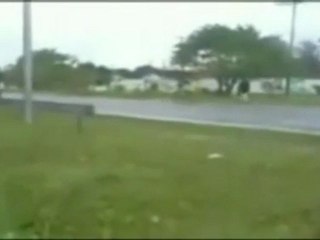 Guy hits sign on bike