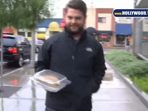 Jack Osbourne leaving Toast on a rainy Monday.