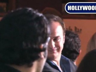 Kim Basinger Gives Cameras A Quick Wave