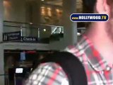 EXCLUSIVE - Miley Cyrus And Boyfriend Liam Hemsworth Spotted At  LAX