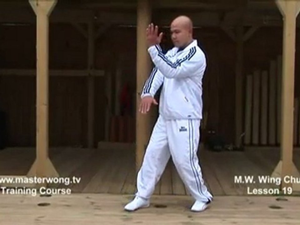 How to do Wing Chun Lesson 19- basic hand exercise_ static blocking for high kicks