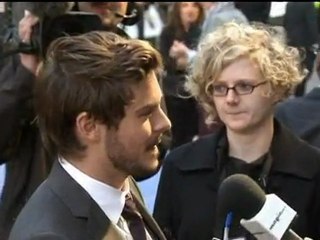 Zac Efron drops a condom at The Lorax premiere