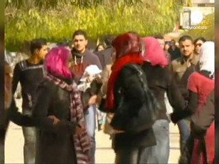 Syrians vote as bombs rain down