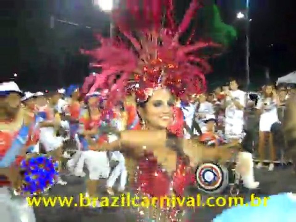 Red headdress: Feather Head Carnival used by Qu...