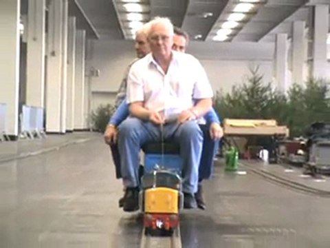 Cologne Livesteam Meeting 2008 British Diesel Loco is approaching with one engineer and two passengers