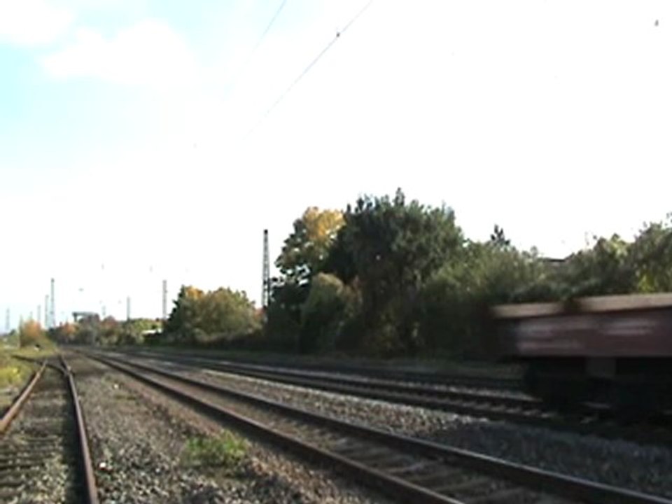 BR140 in Doppeltraktion vor leerem Stahlrollenzug nach Köln bei Roisdorf