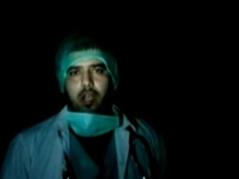 Syrian activists in Homs bury bodies of journalists