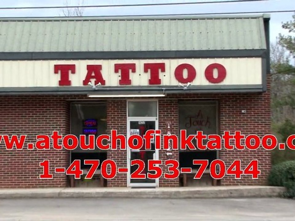 TOUCH OF INK TATTOO THE ONLY TATTOO SHOP IN CUMMING GA.