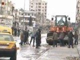 Syrie : nettoyage à Homs, violences dans les autres...