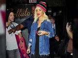 Rihanna Covers Her Dark Roots With a Bold Hat