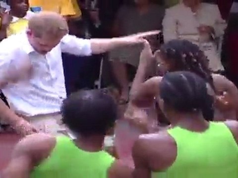 Prince Harry Grooving To Reggae Music Of Bob Marley.