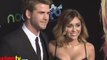 Miley Cyrus and Liam Hemsworth THE HUNGER GAMES World Premiere Arrivals