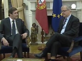 Rehn says Portuguese debt reduction "on track"