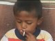 Indonesian 8 year-old smokes 25 cigarettes a day!