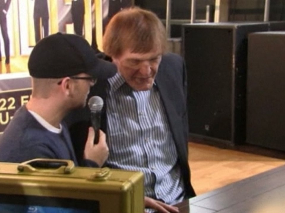 Bond relay ends in London with stars Britt Ekland and Richard Kiel on hand to greet fans.