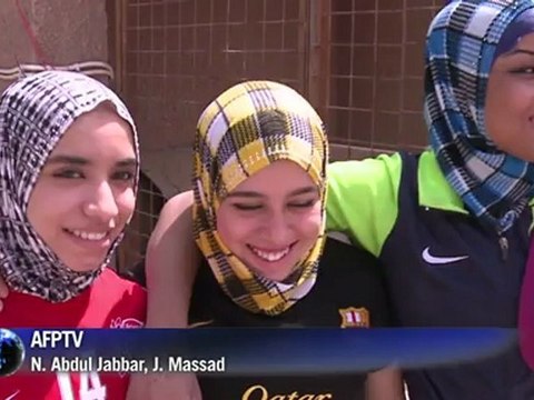 Weightlifting: Iraqi girls raise weights and eyebrows