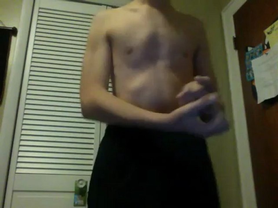 teen bodybuilder flexing arms