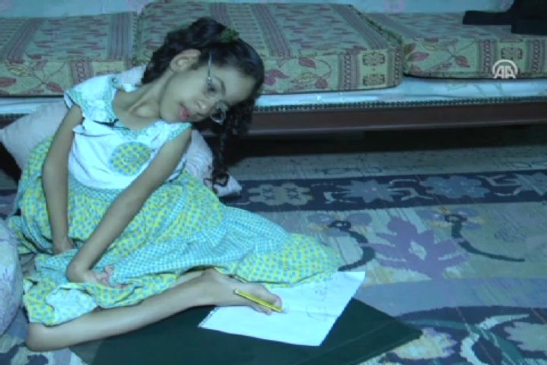 Diliyle bilgisayar kullanıyor