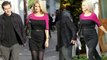 Pregnant Holly Madison Shows Off Her Growing Baby Bump in Belted Dress