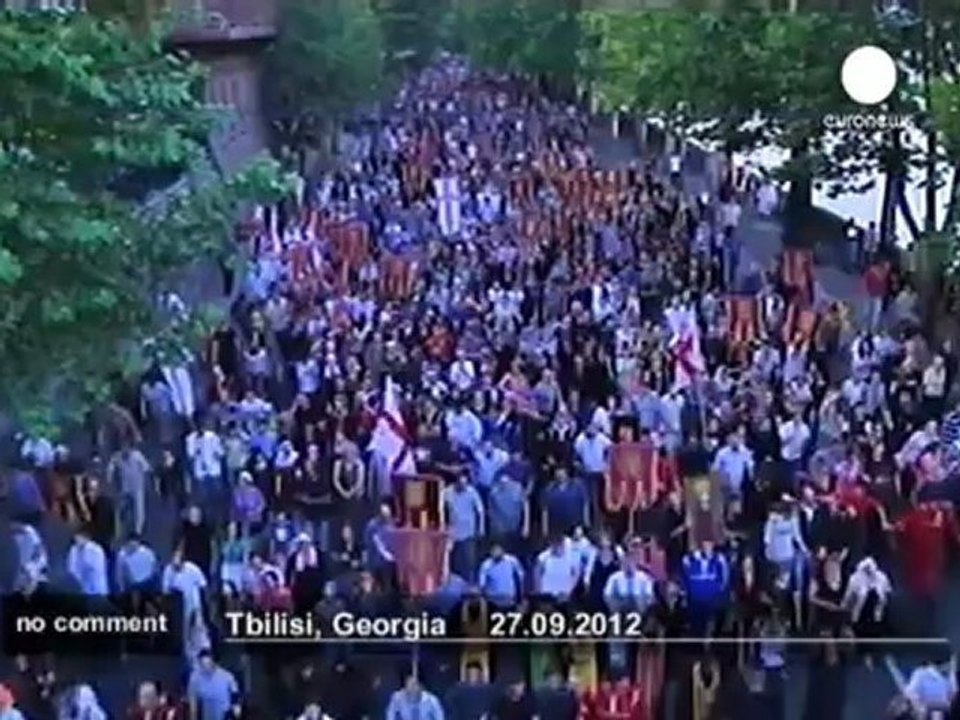 Georgian orthodox priests march against... - no comment