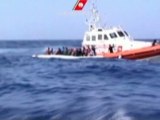 Italy rescues more than 80 migrants from boat in rough seas