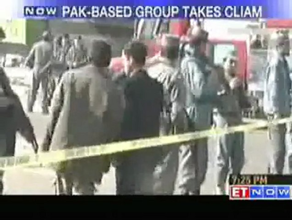 Karzai returns to Kabul after shrine attack